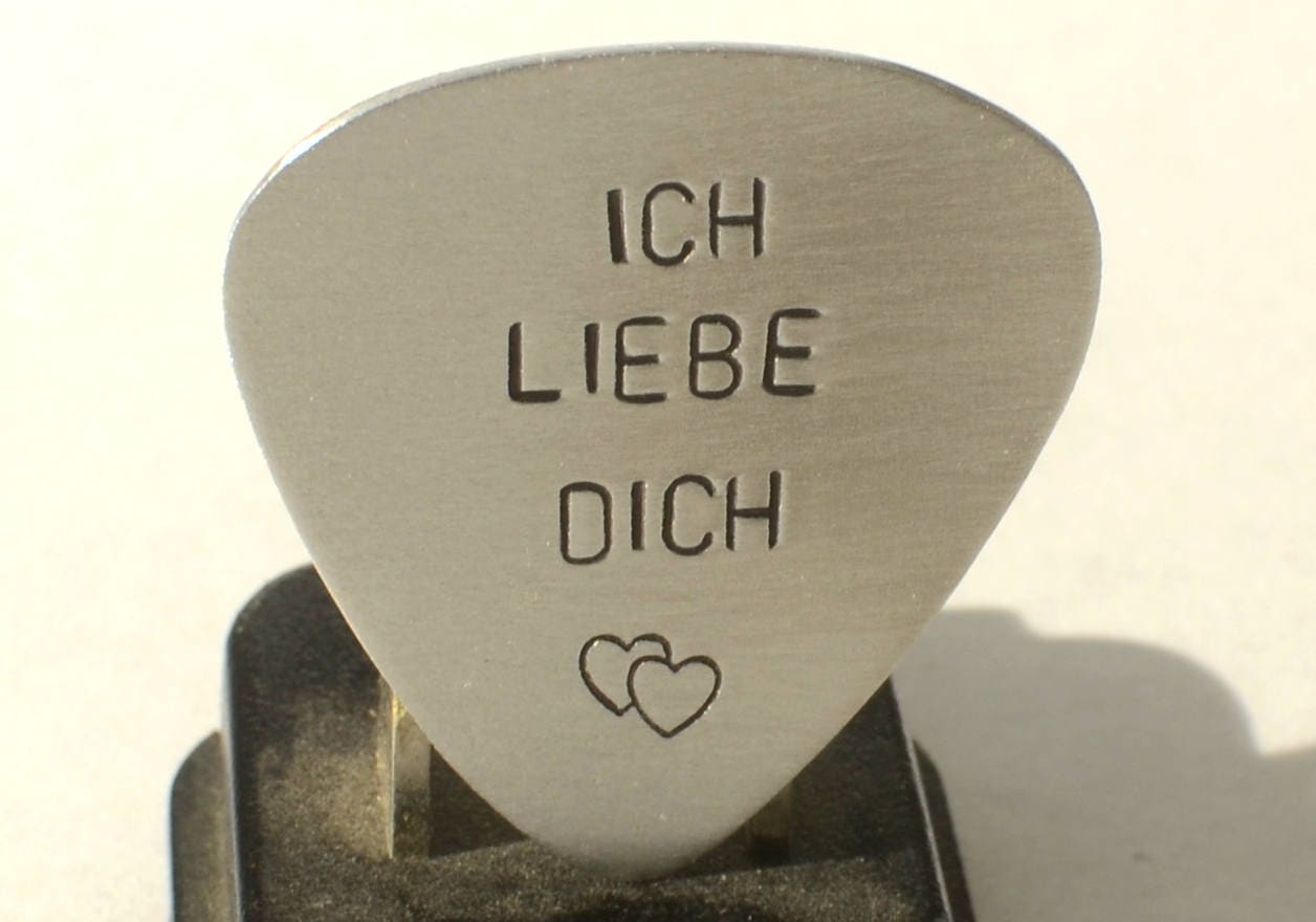 Sterling silver guitar pick with Ich liebe dich and a heart