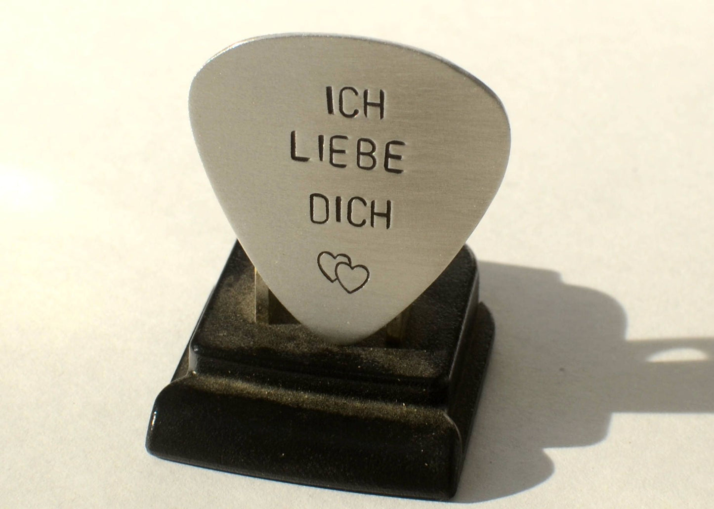 Sterling silver guitar pick with Ich liebe dich and a heart