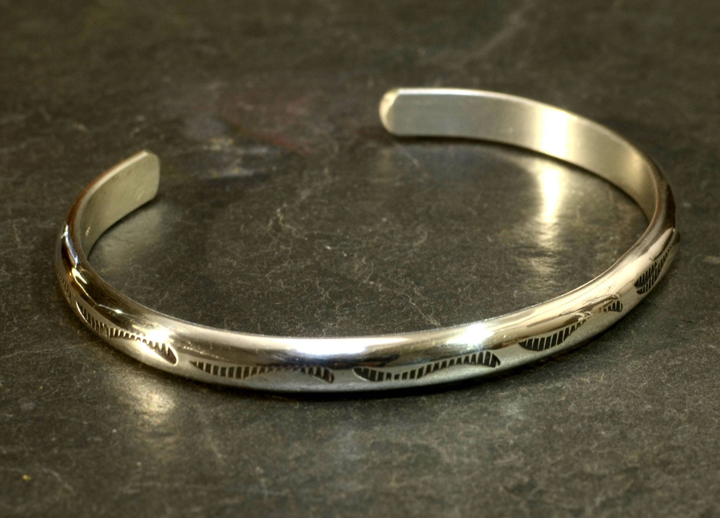 Sterling Silver Half Round Bracelet Imprinted with Native American Metal Stamps