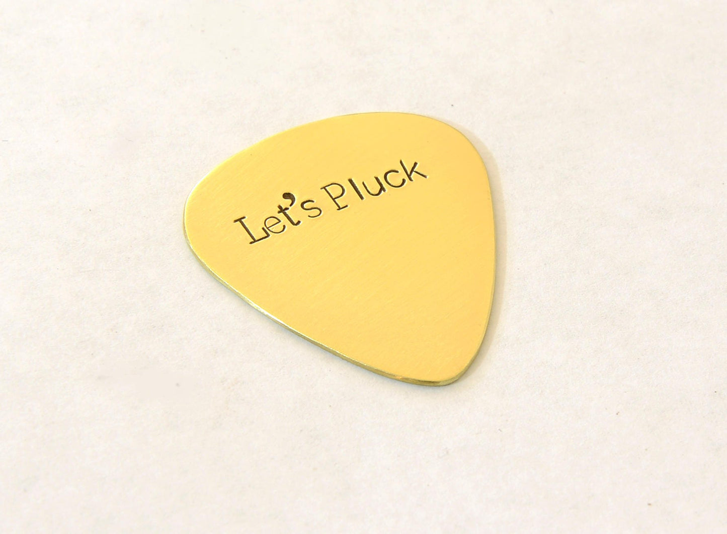 Let’s Pluck brass guitar pick