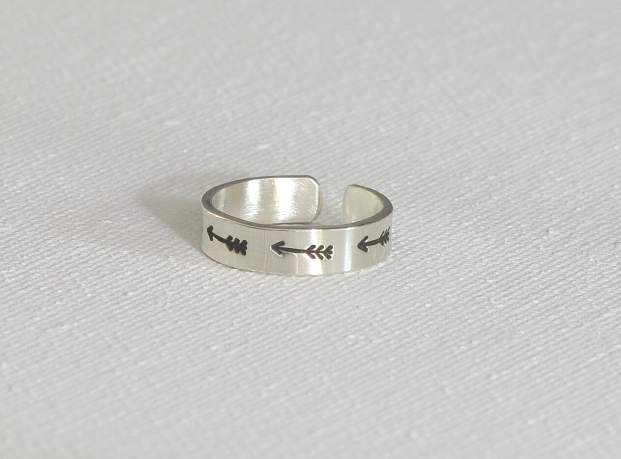 Sterling silver toe ring with arrows on narrow 925 adjustable band