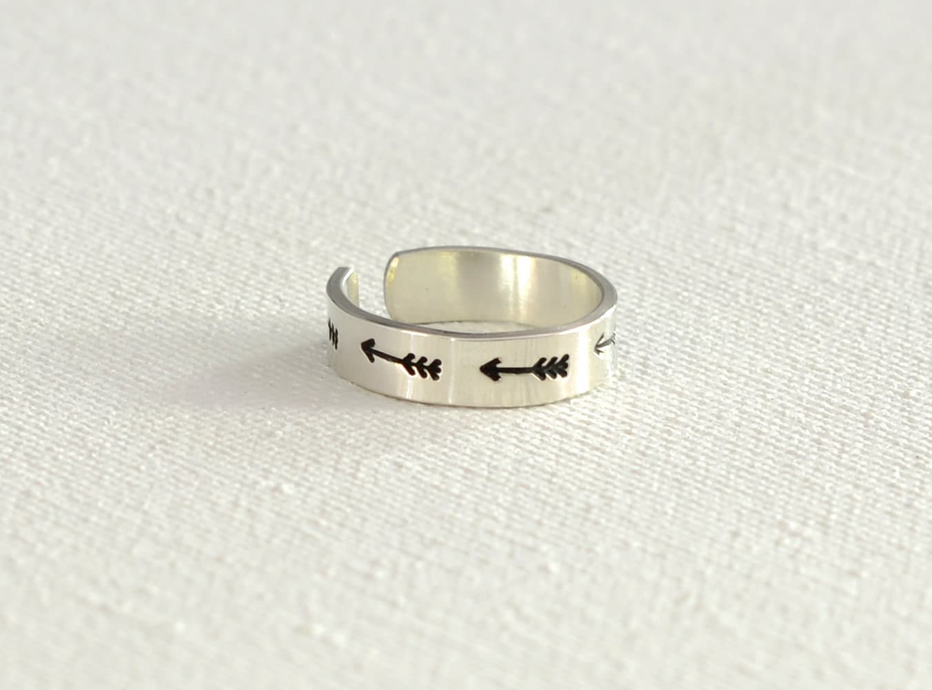 Sterling silver toe ring with arrows on narrow 925 adjustable band