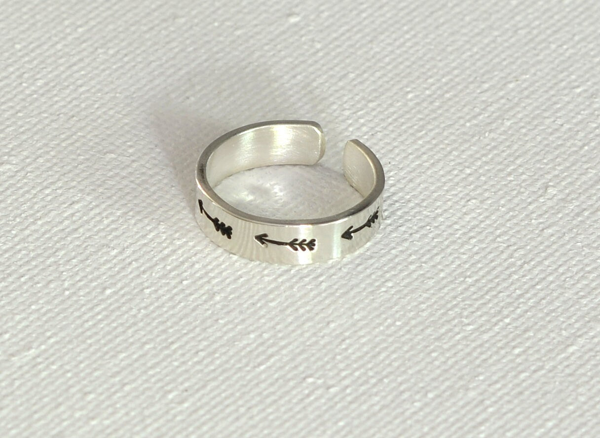 Sterling silver toe ring with arrows on narrow 925 adjustable band