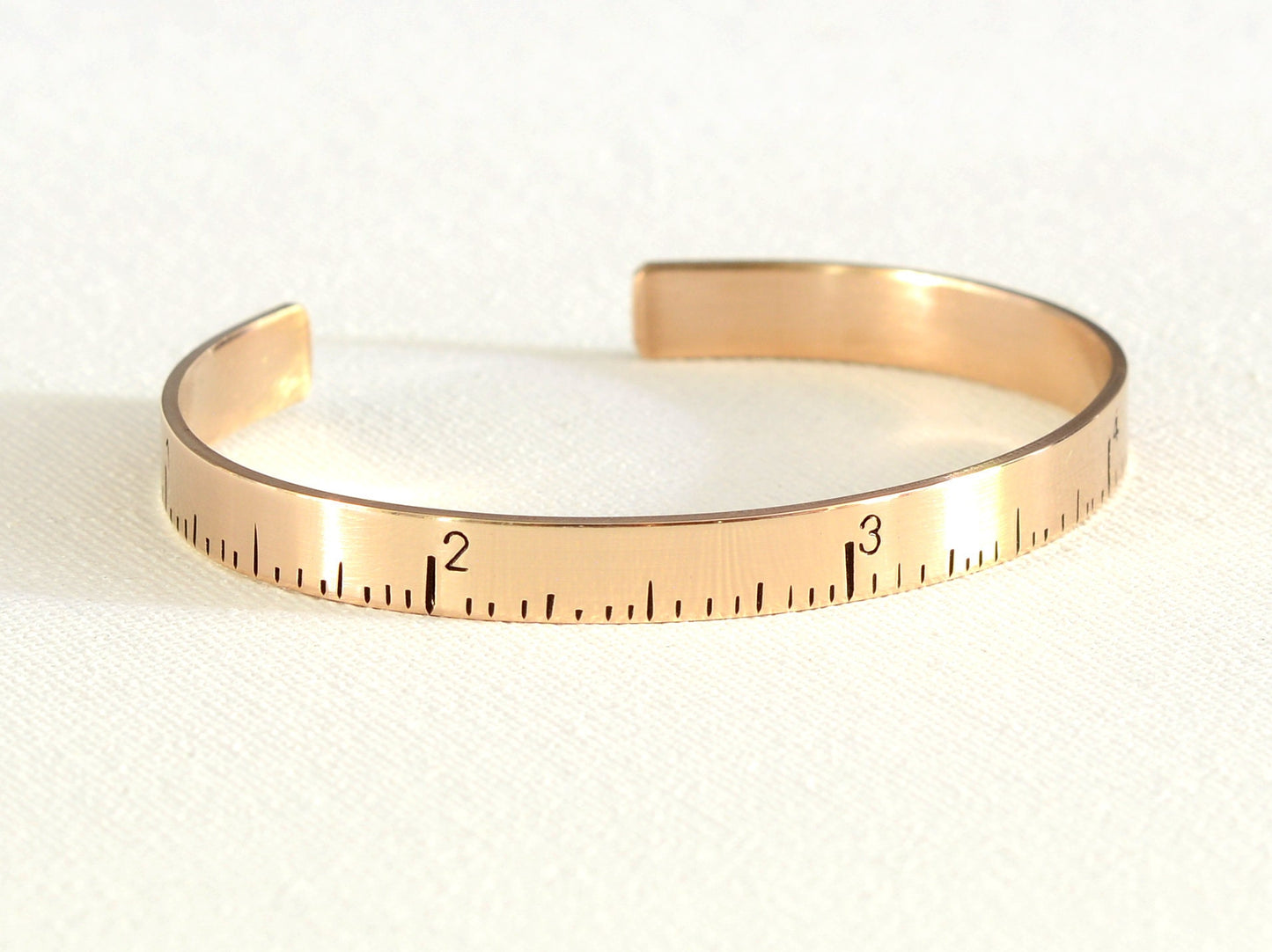 Ruler bracelet in bronze