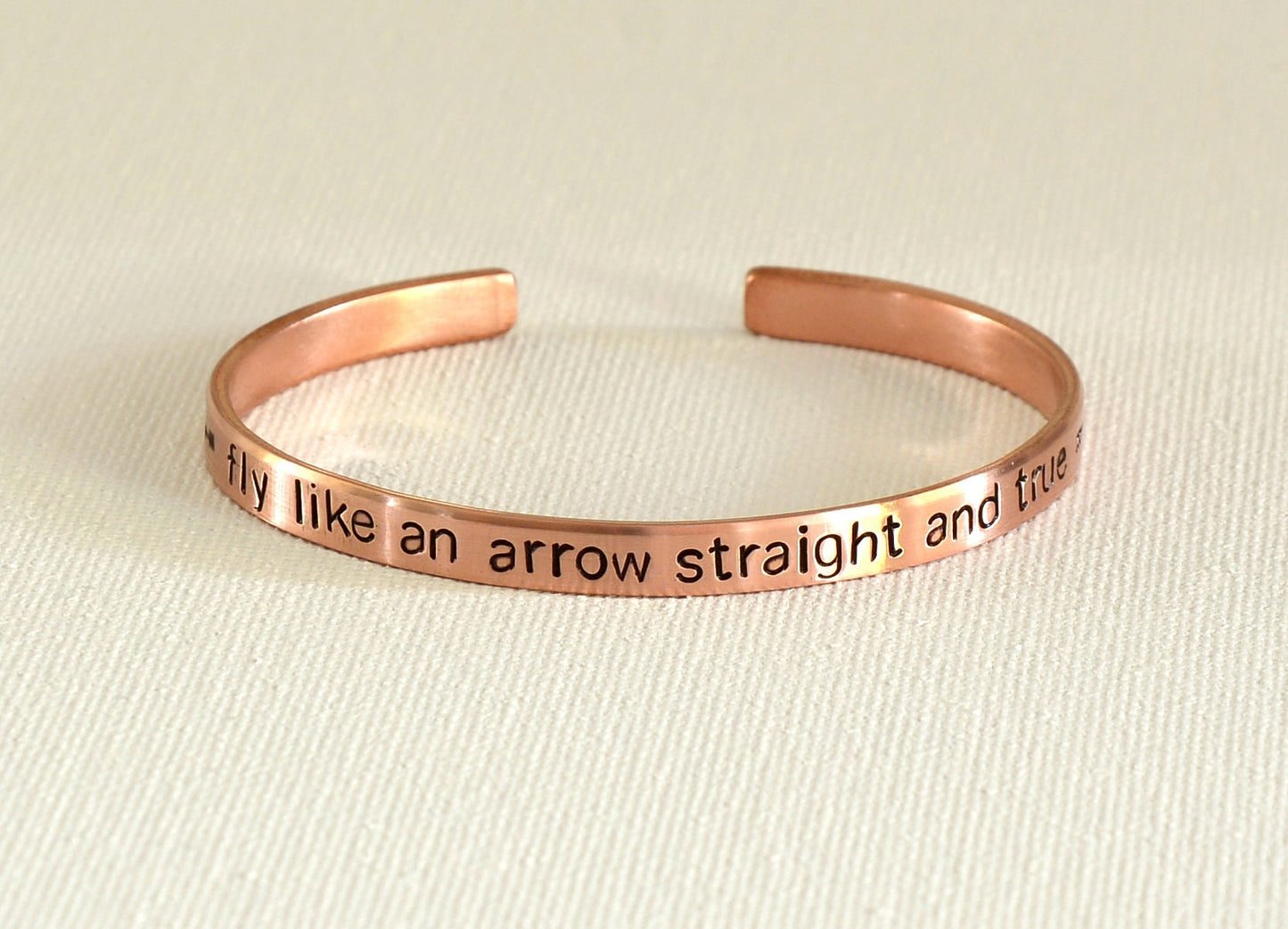 Fly like an arrow straight and true copper bracelet