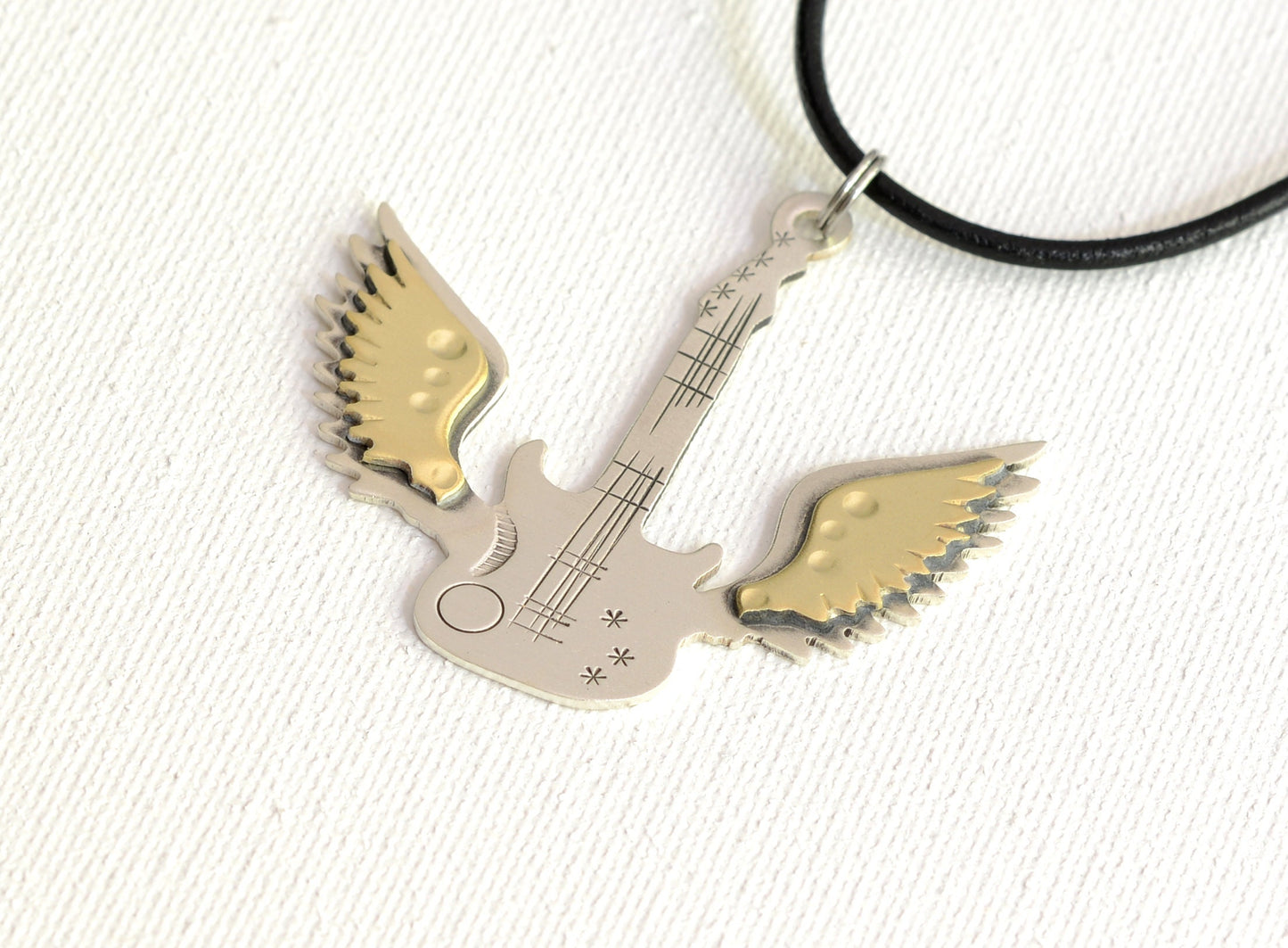 Winged guitar sterling guitar necklace with brass wings