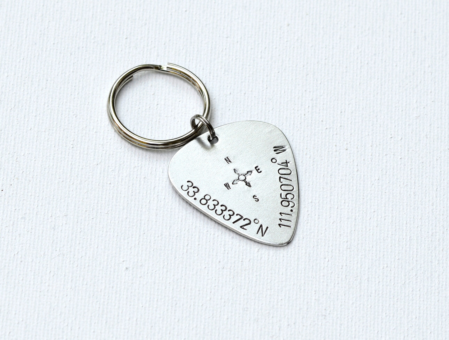 Guitar Pick with Personalized Latitude Longitude Coordinates on a keychain