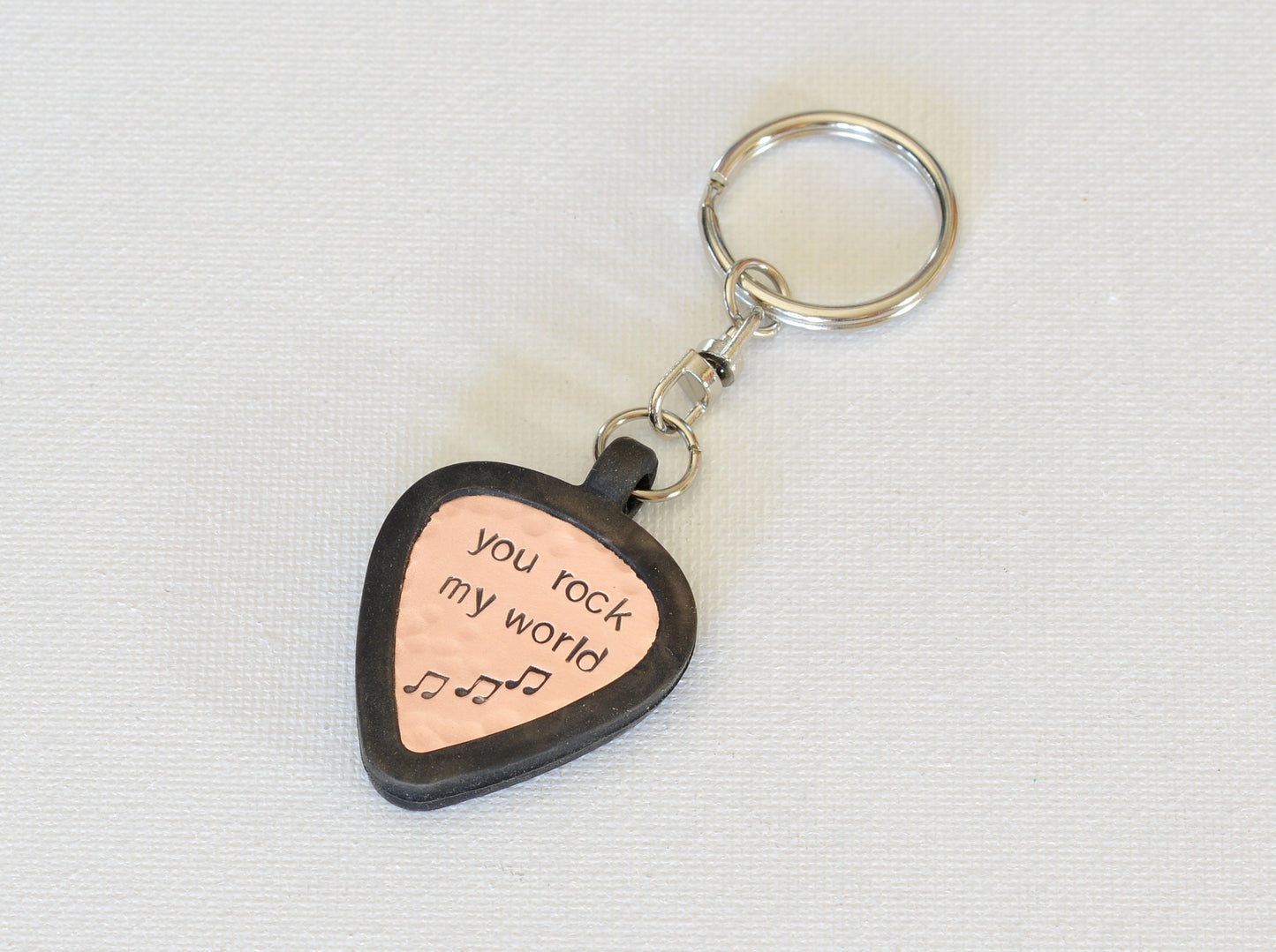 Copper guitar pick keychain with rubber holder