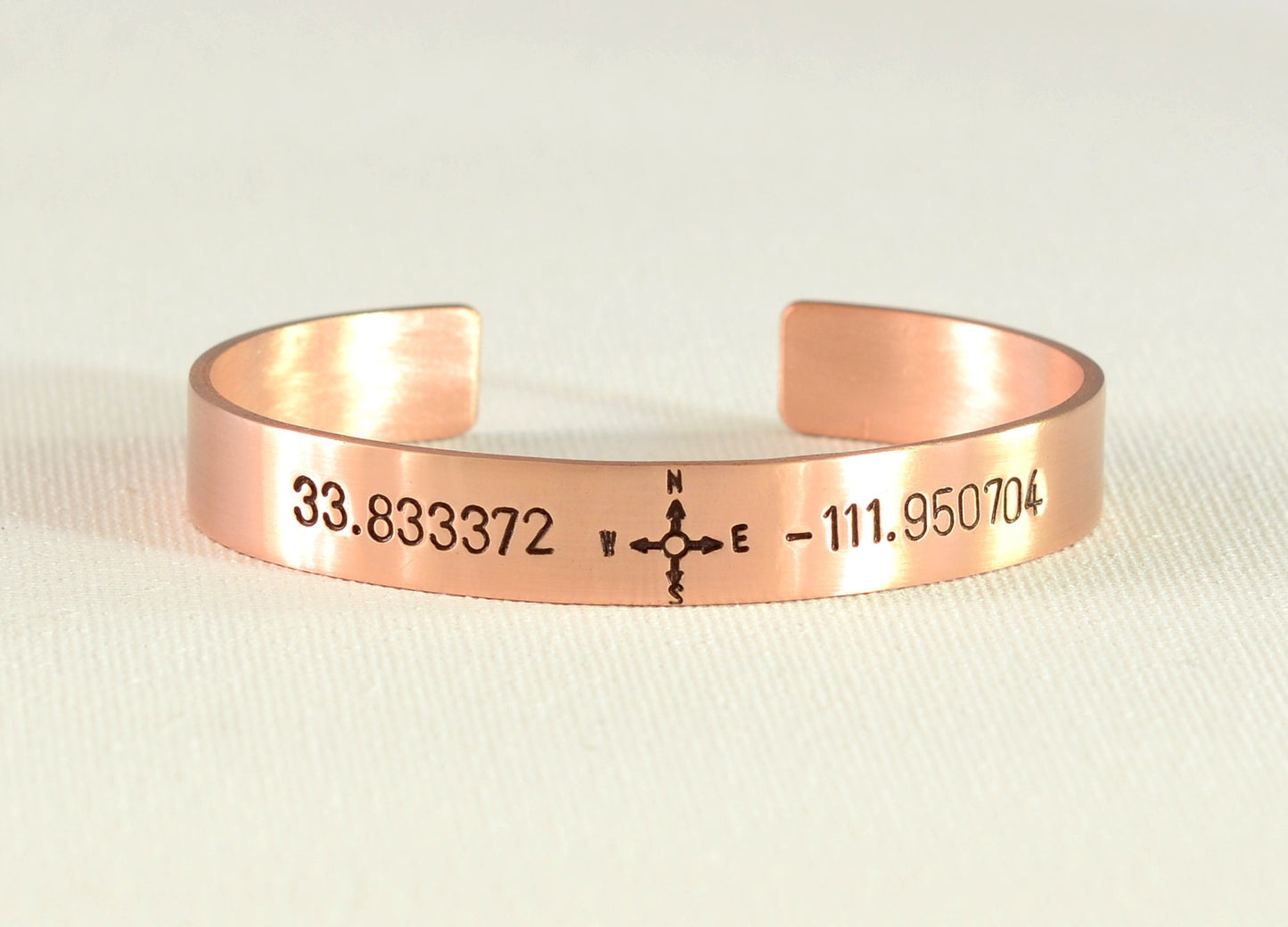 Personalized Latitude longitude coordinates on bronze cuff bracelet with compass design
