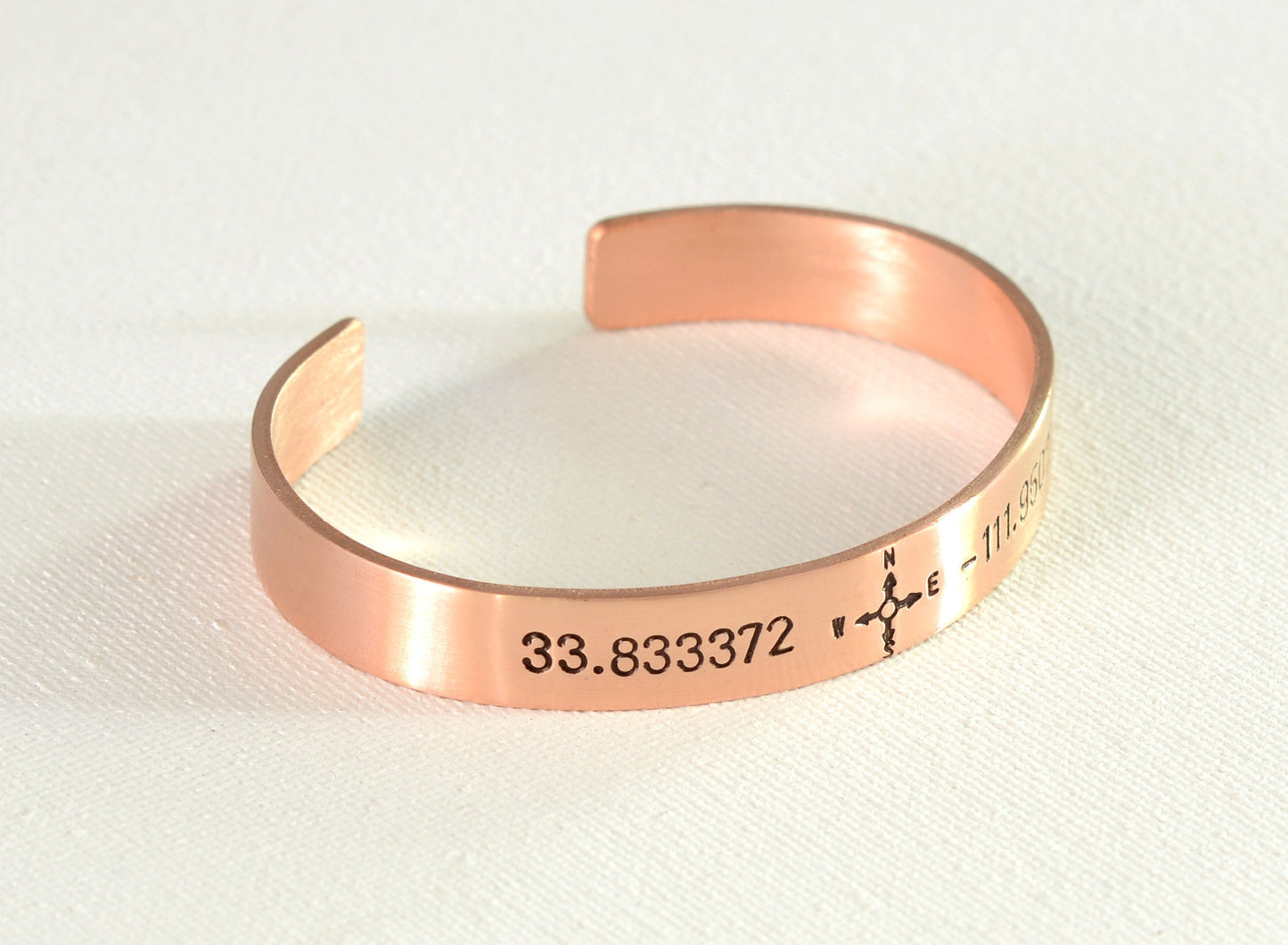 Personalized Latitude longitude coordinates on bronze cuff bracelet with compass design