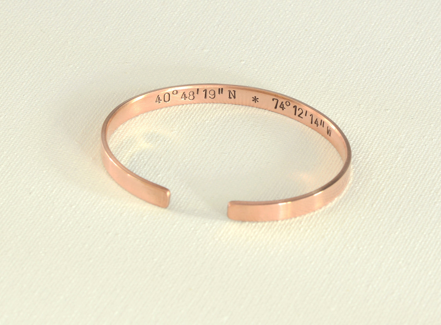 Latitude longitude copper bracelet with coordinates on the inside