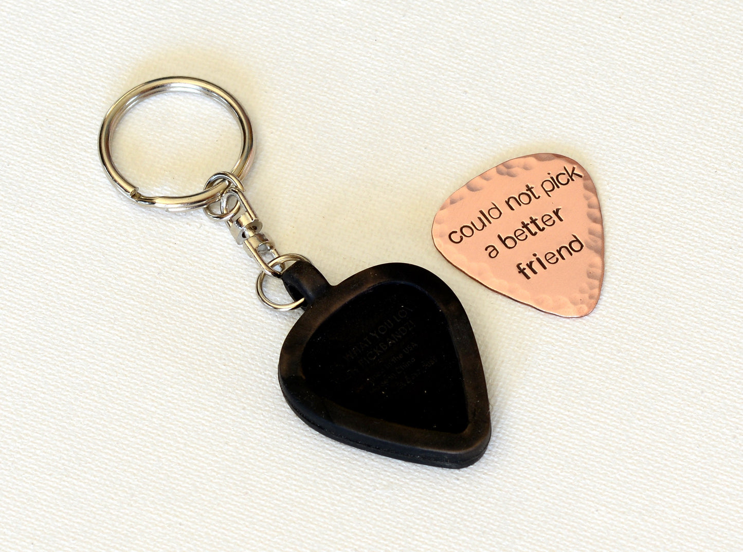 Customized copper guitar pick with rubber holder