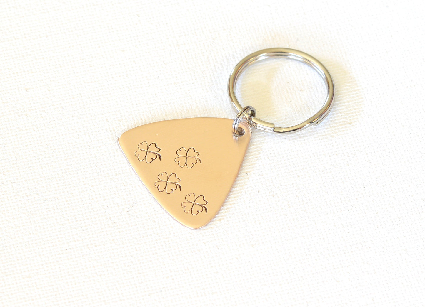 Bronze Lottery Ticket Scratcher with lucky 4 Leaf Clovers