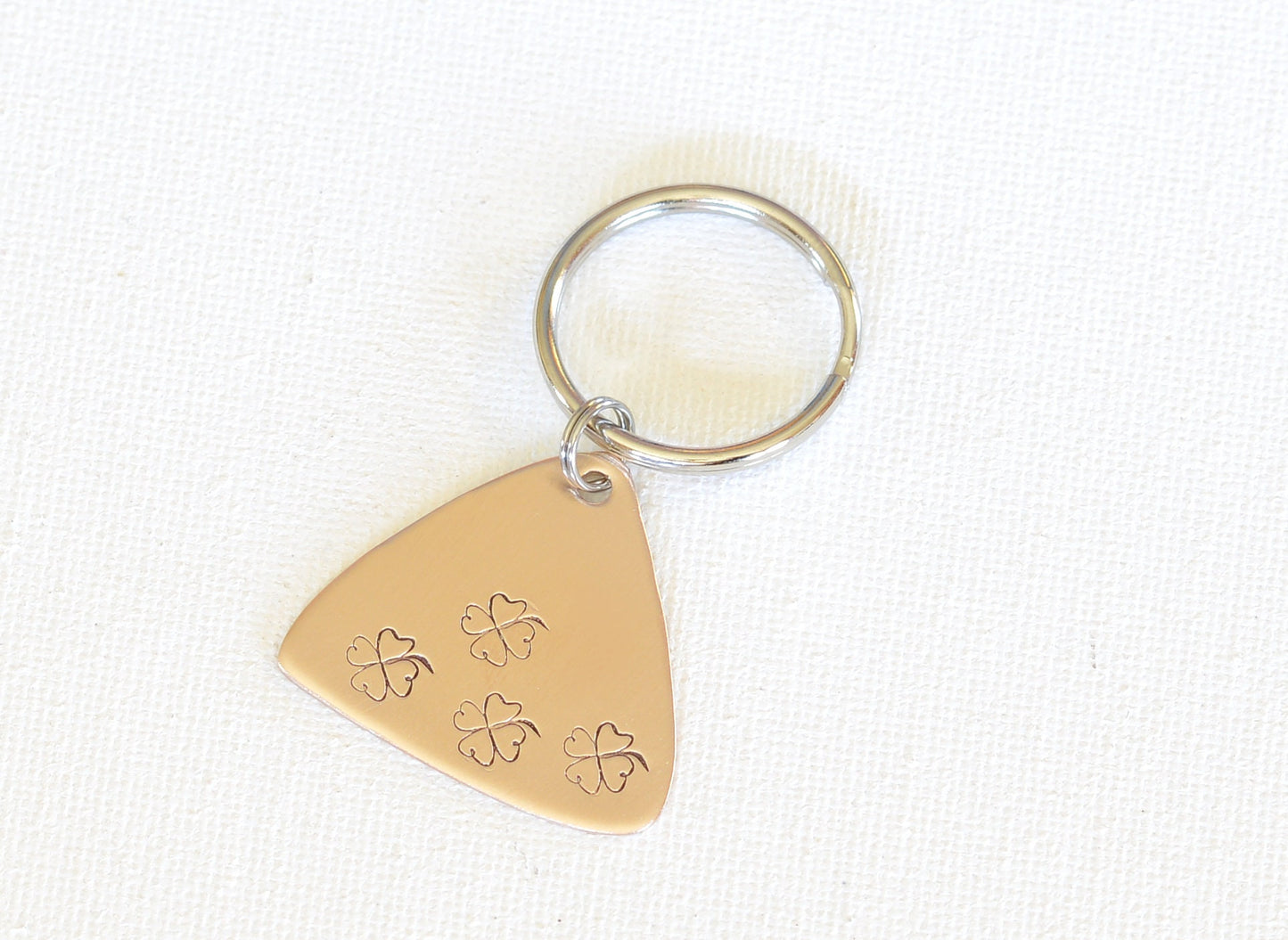 Bronze Lottery Ticket Scratcher with lucky 4 Leaf Clovers