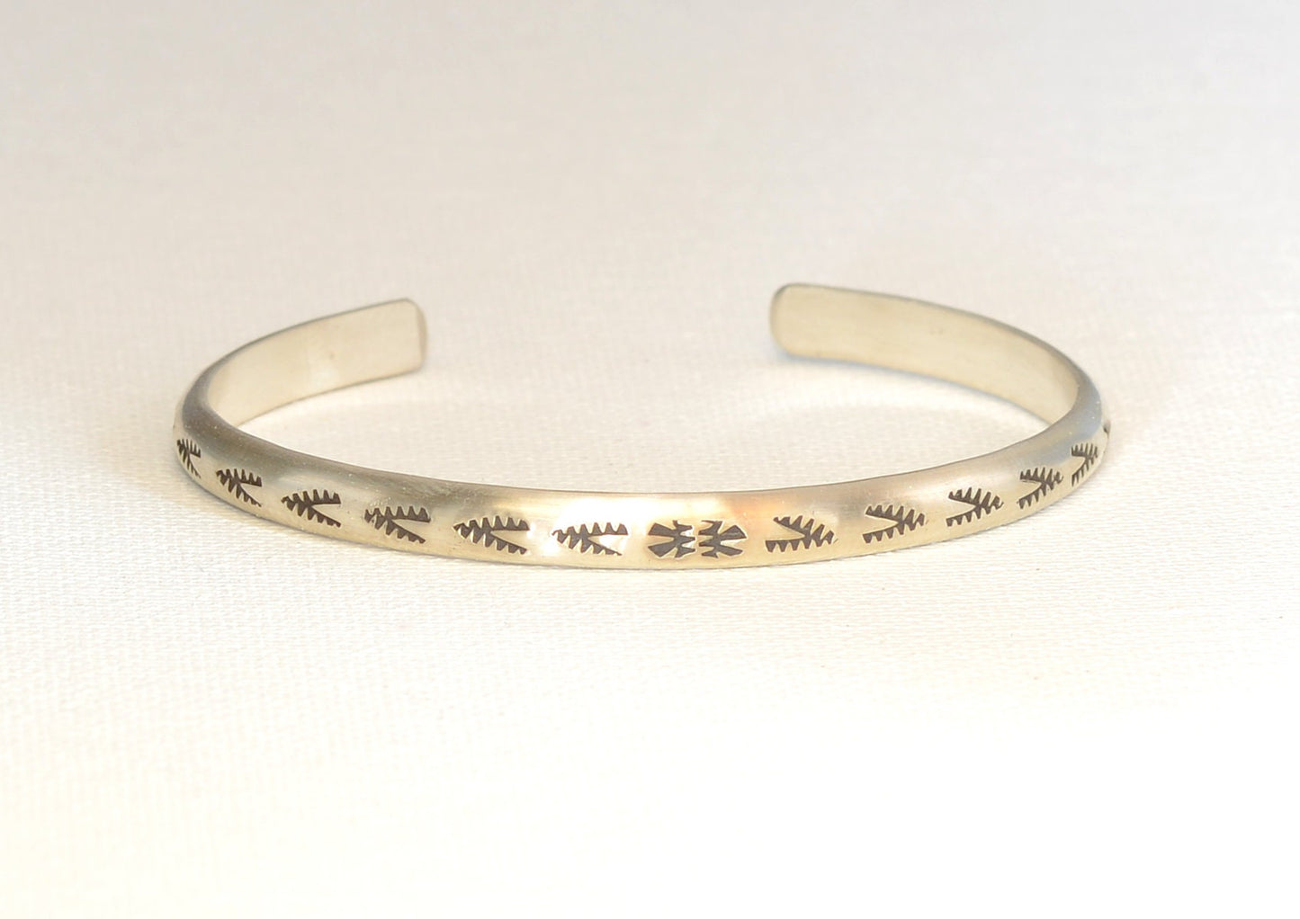Sterling Silver Half Round Cuff Bracelet imprinted with Handmade Native American Metal Stamps