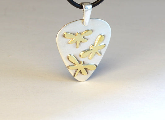 Dragonfly Artisan Sterling Silver Guitar Pick Necklace as a Fusion of Visual Art and Music