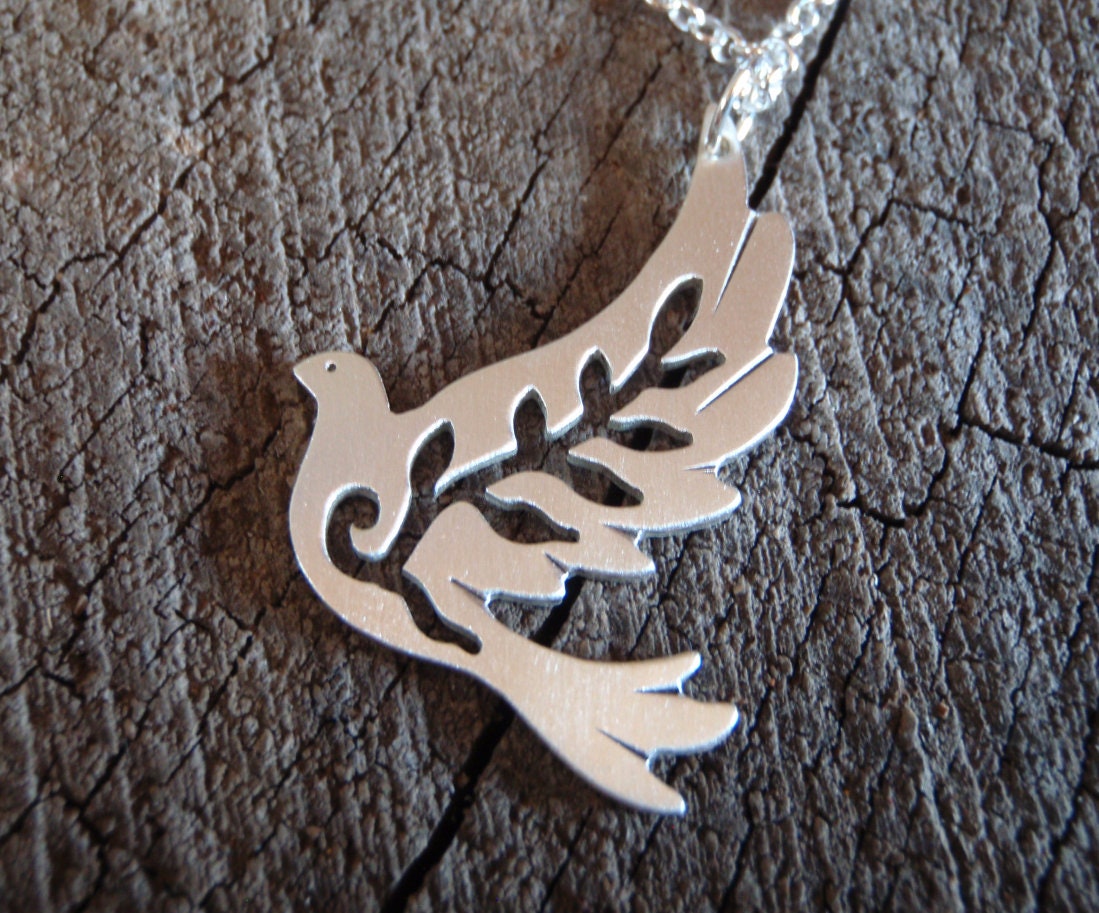 Sterling silver dove necklace with leaves cut out