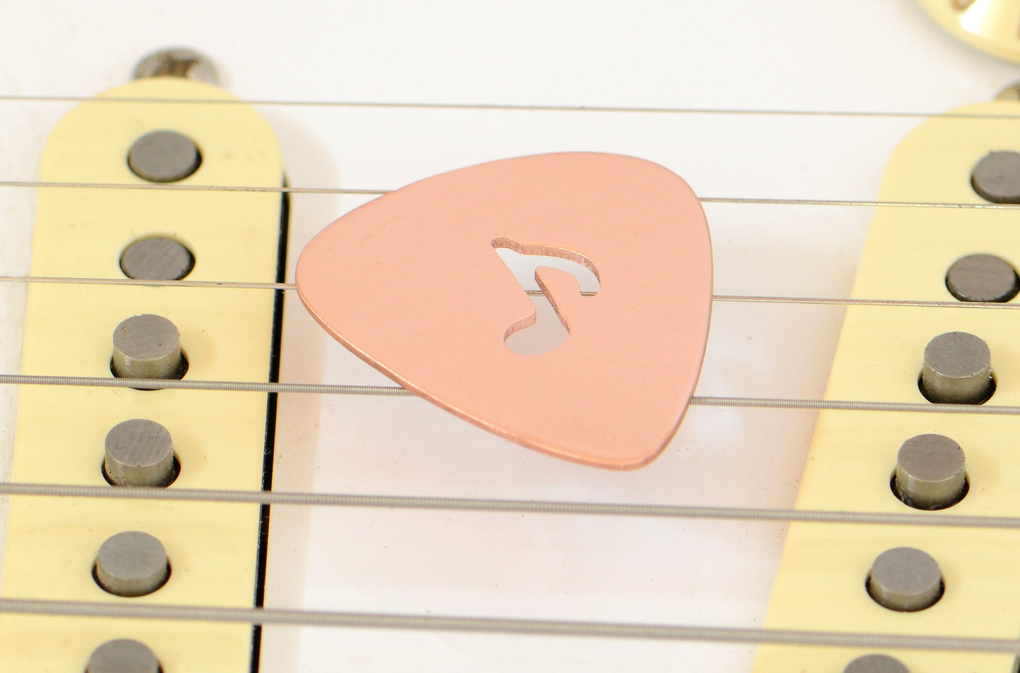 Copper Guitar Pick with 8th Note as Musical Inspiration to keep you Rocking
