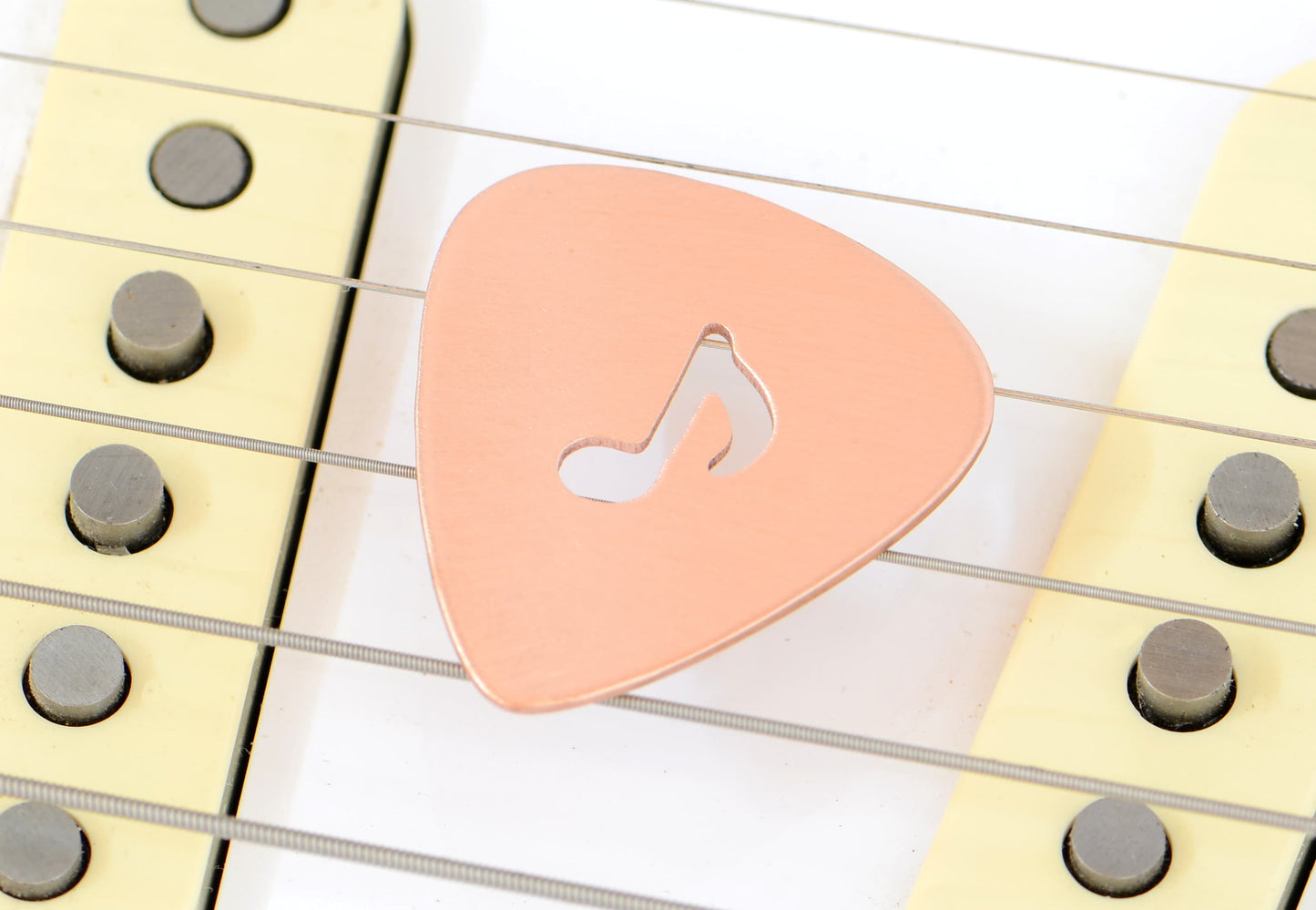 Copper Guitar Pick with 8th Note as Musical Inspiration to keep you Rocking