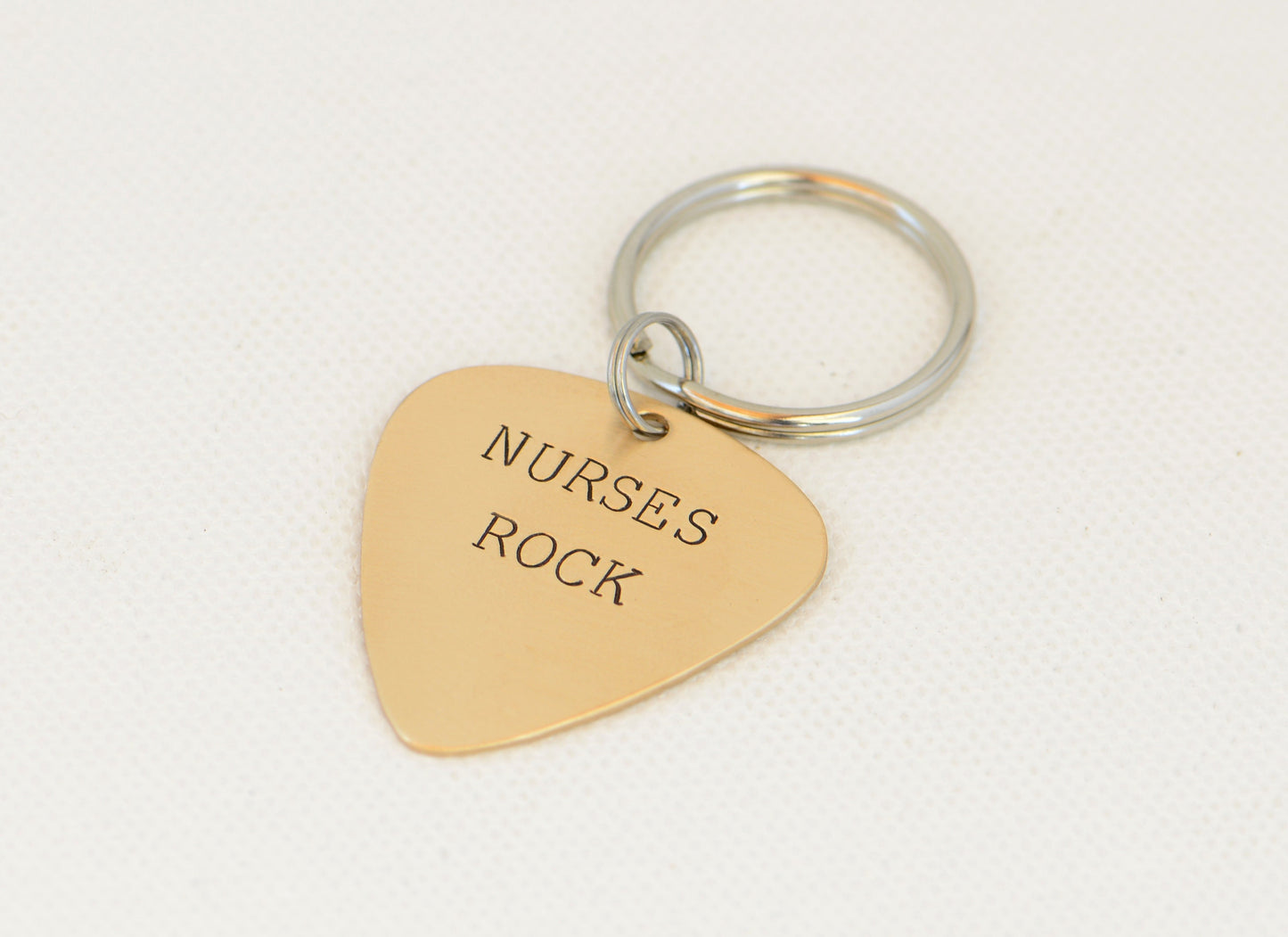 Nurses Rock Guitar Pick Keychain in Bronze