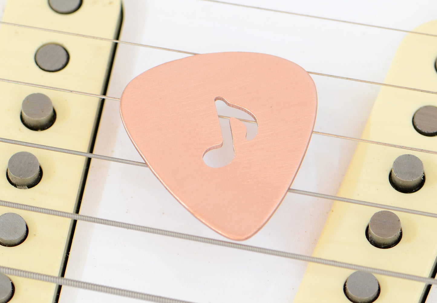 Copper Guitar Pick with 8th Note as Musical Inspiration to keep you Rocking