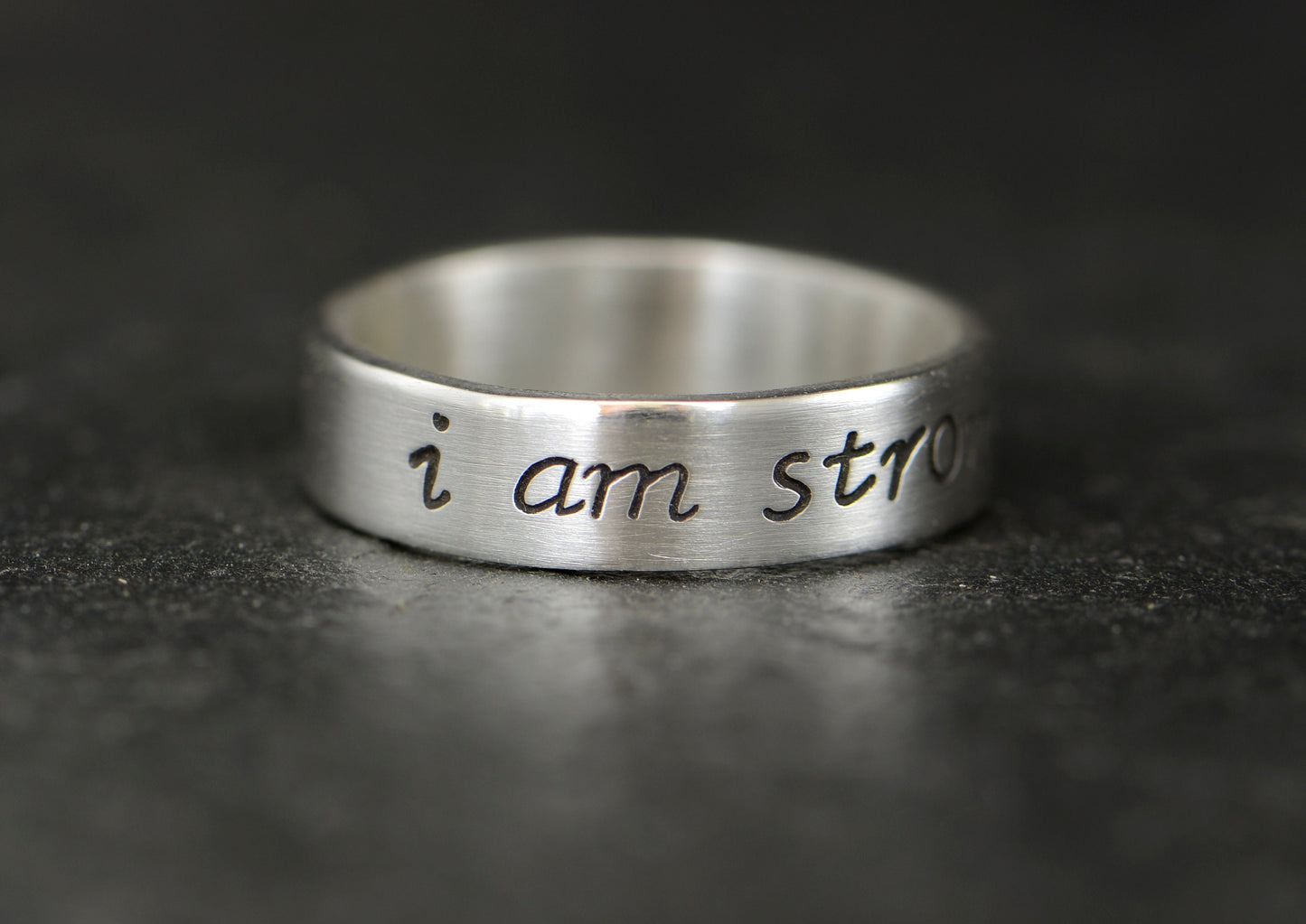 I am strong sterling silver ring