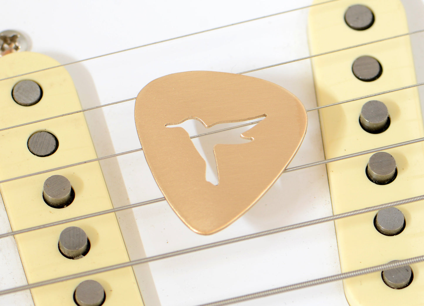 Hummingbird on Guitar Pick in Bronze