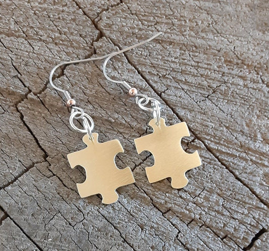 Puzzle piece design brass earrings