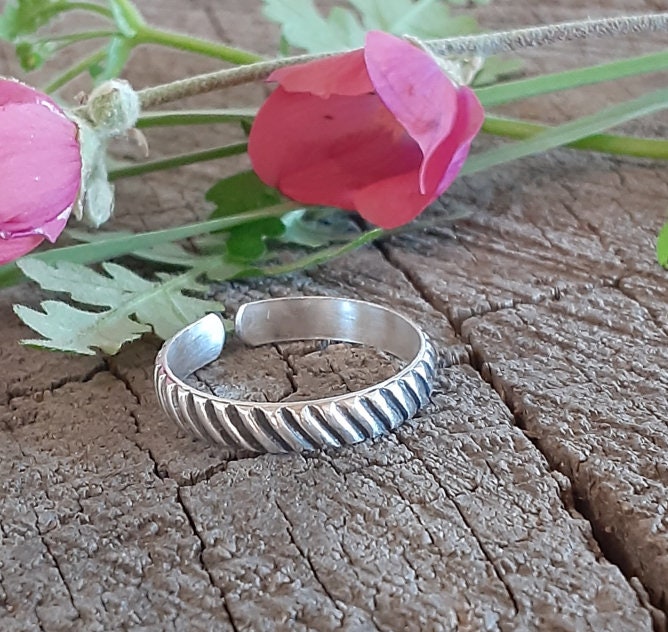 Adjustable sterling silver thumb ring or finger ring