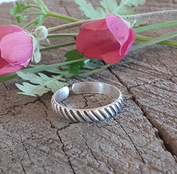 Adjustable sterling silver thumb ring or finger ring