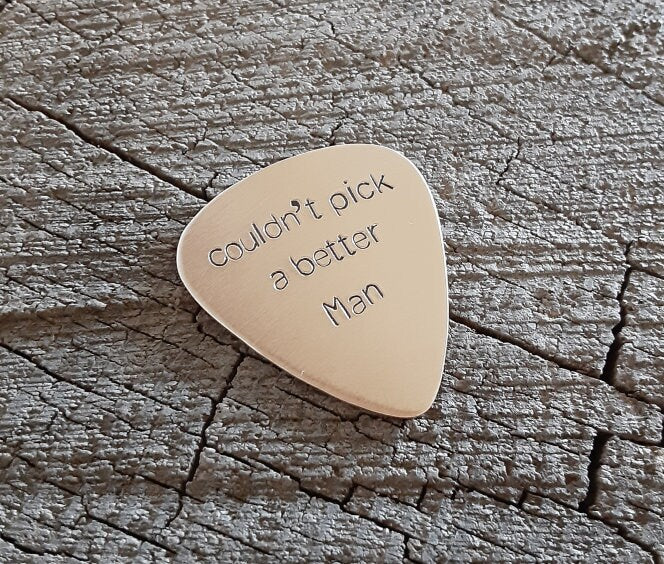 Guitar pick in bronze for your man