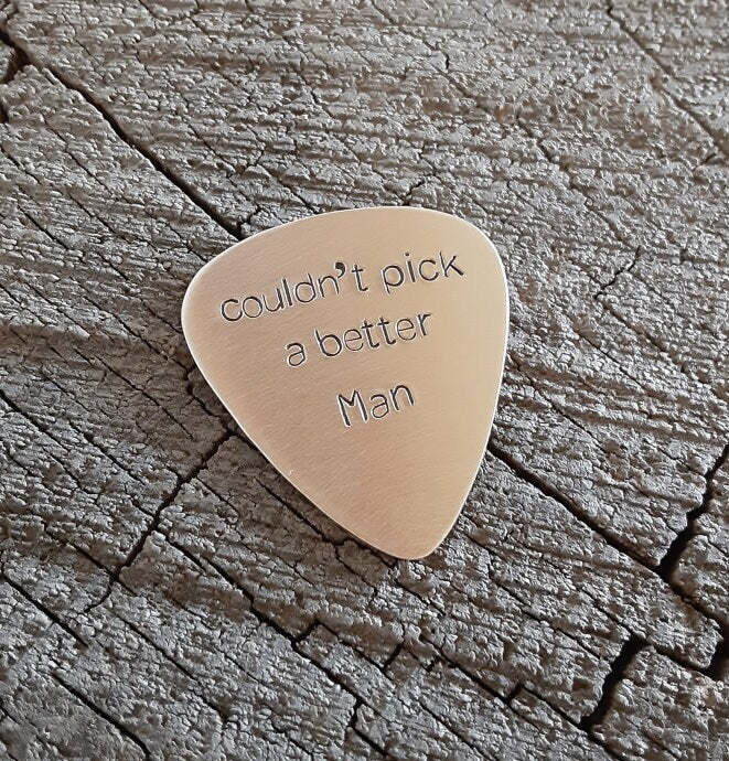 Guitar pick in bronze for your man