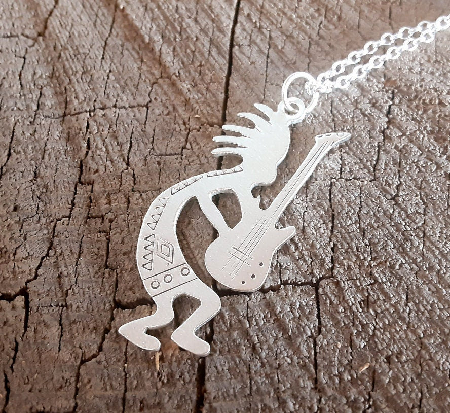 Sterling silver kokopelli necklace with guitar
