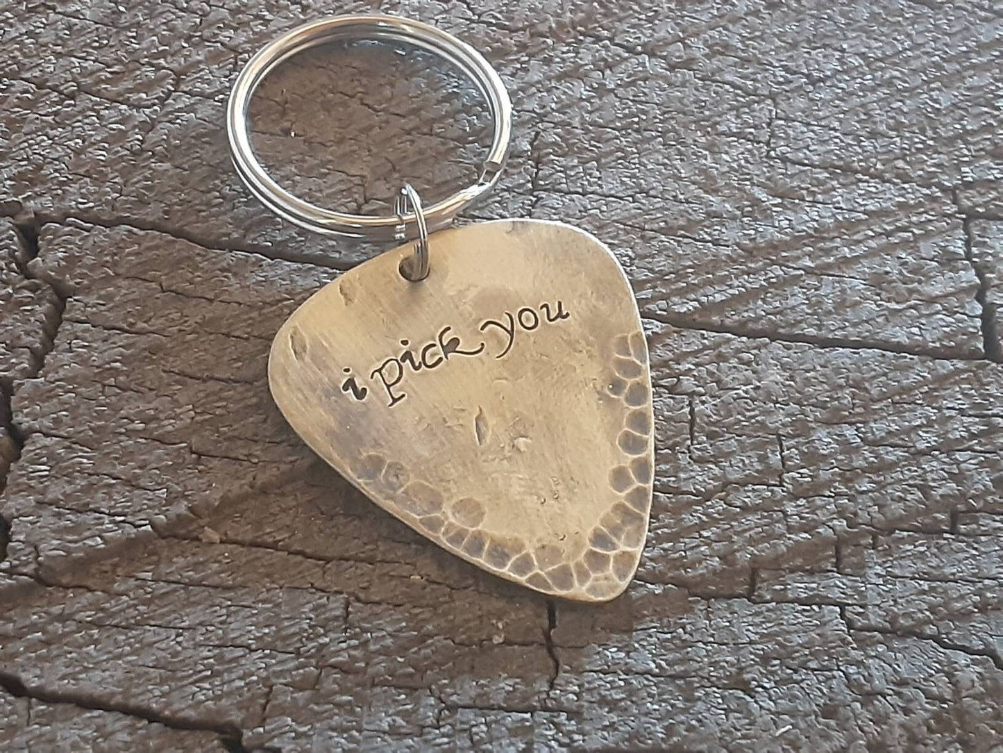 I pick you brass guitar pick key chain in a distressed and rustic finish