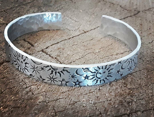 Sun moon and stars on impressively thick sterling silver cuff bracelet
