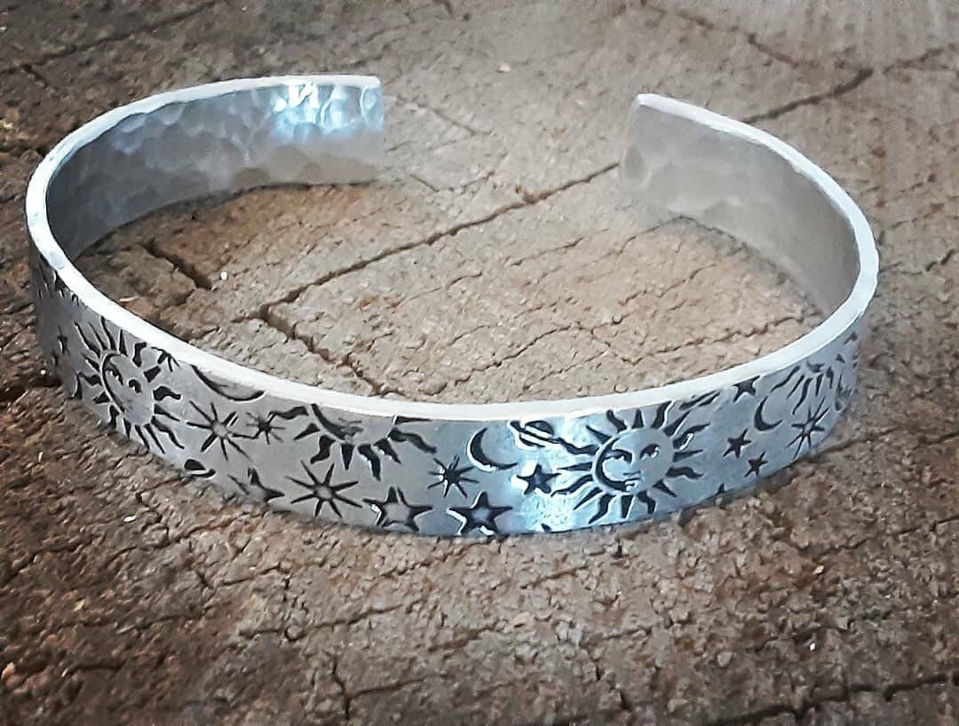 Sun moon and stars on impressively thick sterling silver cuff bracelet
