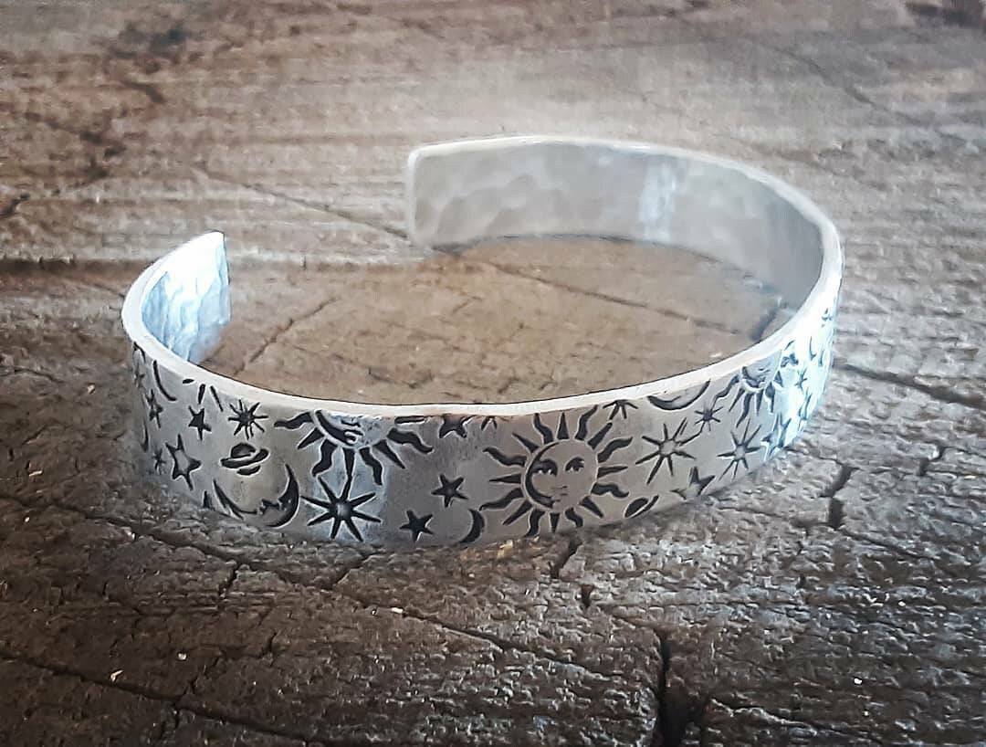 Sun moon and stars on impressively thick sterling silver cuff bracelet