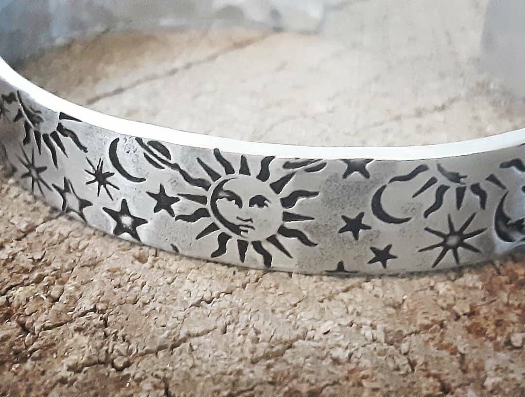 Sun moon and stars on impressively thick sterling silver cuff bracelet