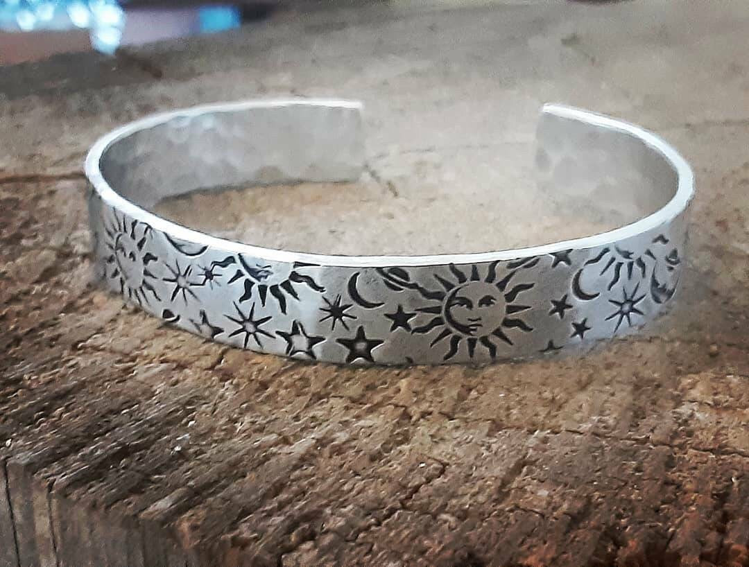 Sun moon and stars on impressively thick sterling silver cuff bracelet