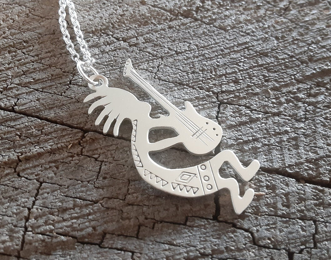 Sterling silver kokopelli necklace with guitar