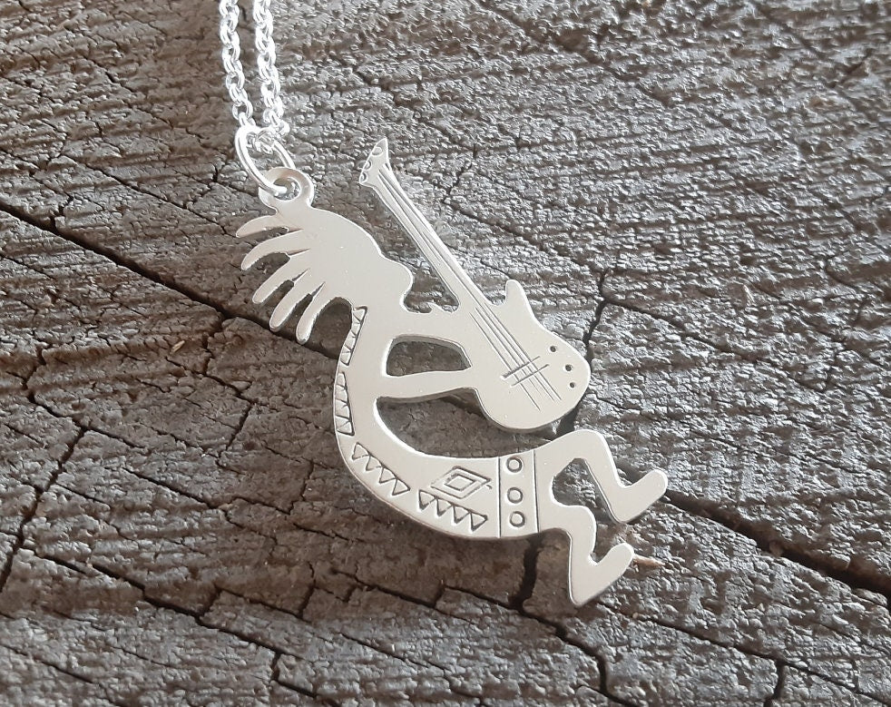Sterling silver kokopelli necklace with guitar