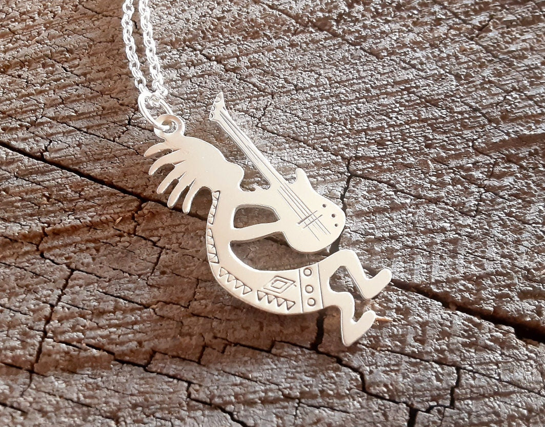 Sterling silver kokopelli necklace with guitar