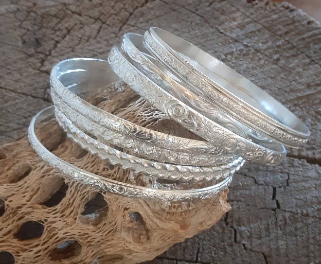Stackable sterling silver bangles in a set without patina