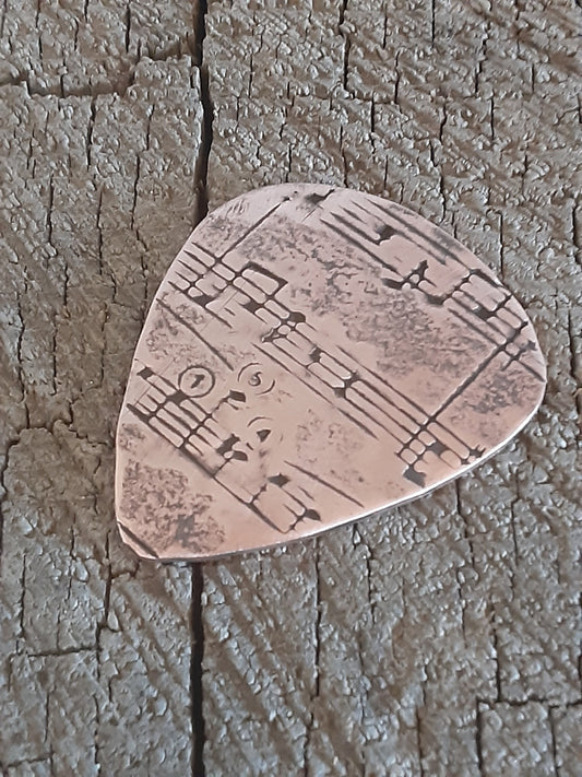 Copper guitar pick with music notes - for Elise