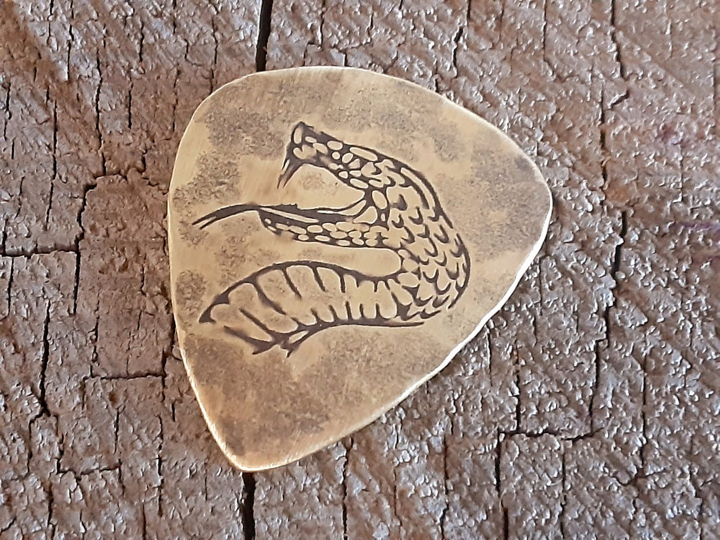 brass guitar pick - playable with snake head