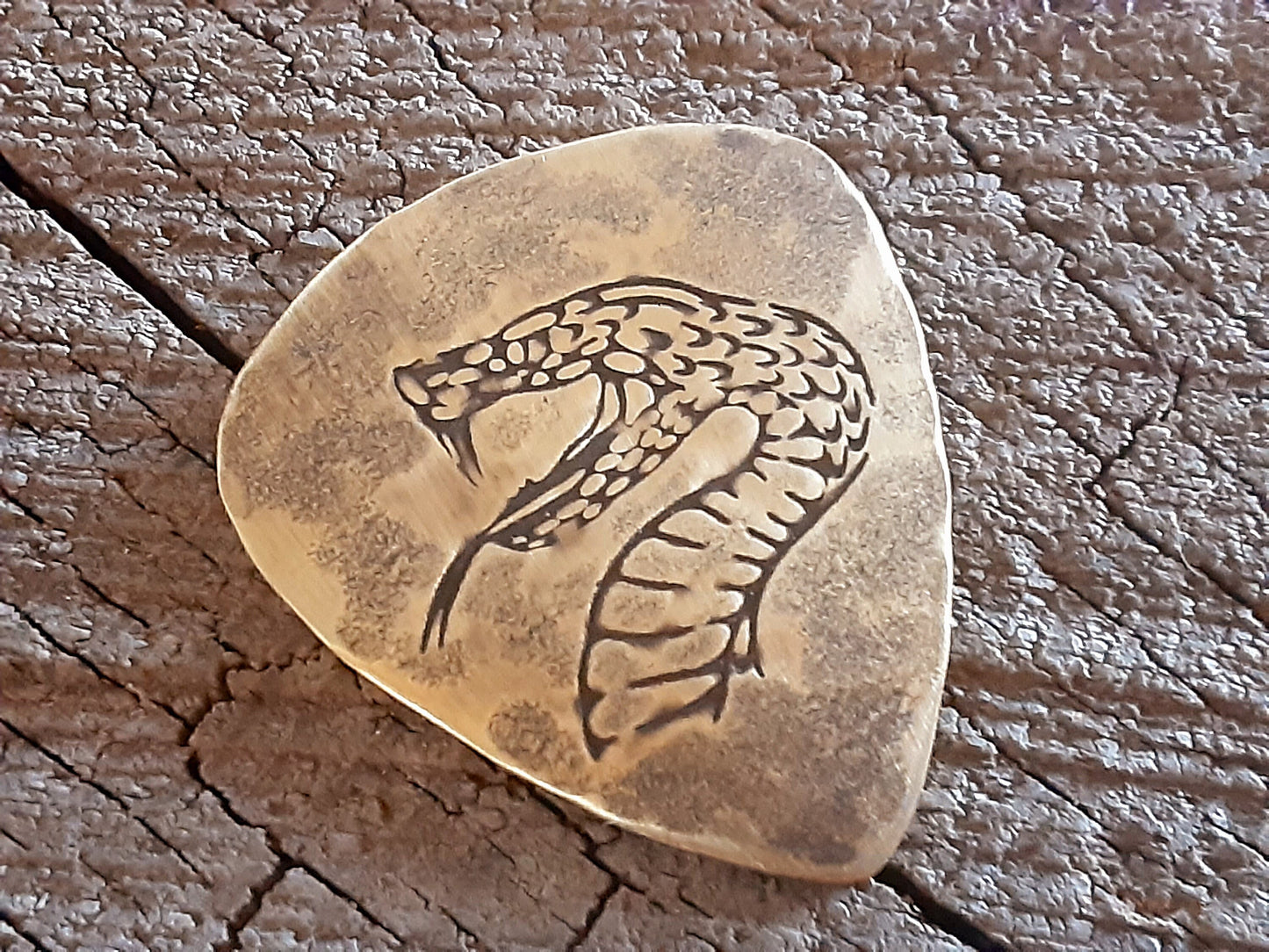 brass guitar pick - playable with snake head