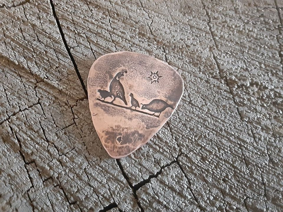 Desert quail on copper guitar pick