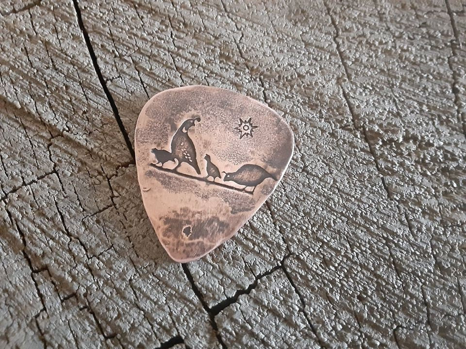 Desert quail on copper guitar pick