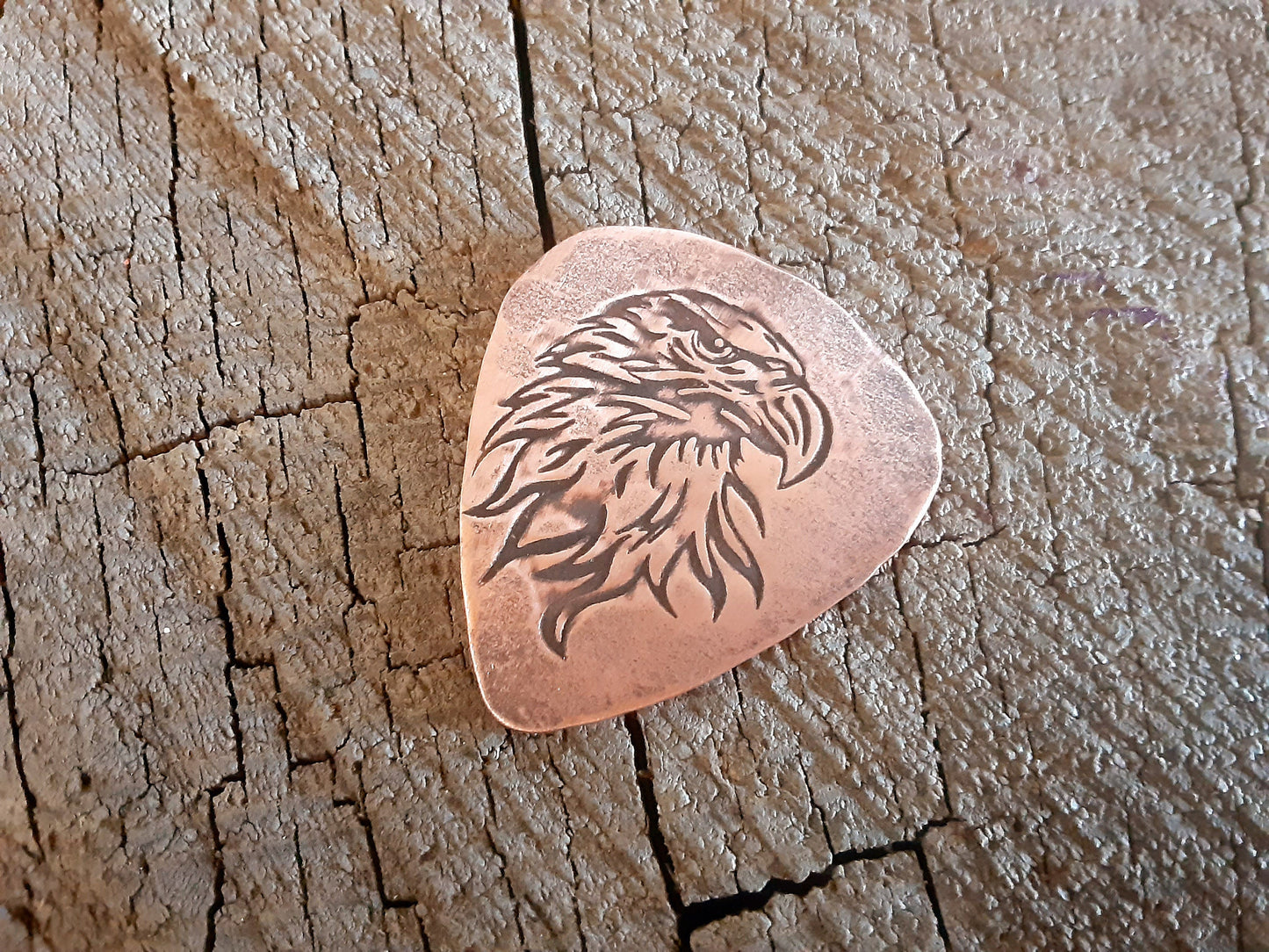 Eagles on hammered copper guitar pick