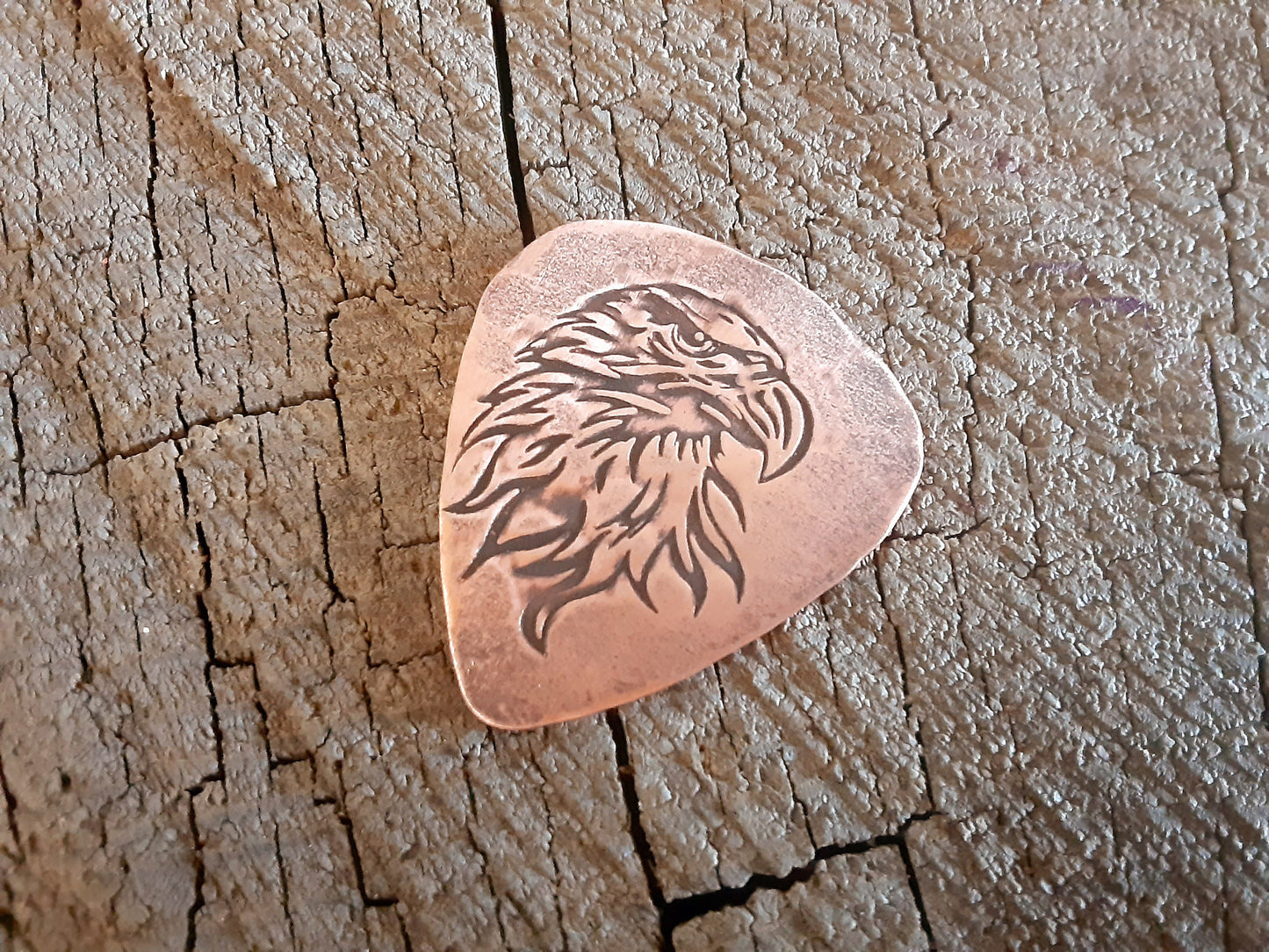 Eagles on hammered copper guitar pick